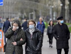 Passers-by in respirator masks