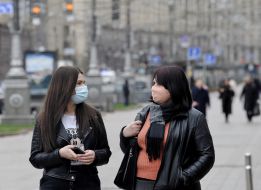 Passers-by in respirator masks