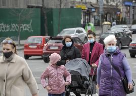Passers-by in respirator masks