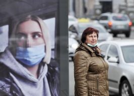 Woman at a public transport stop