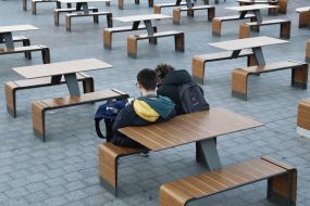 Young people sitting on a bench
