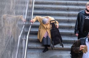 Elderly woman with a shopping bag