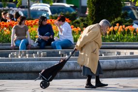 Elderly woman with a shopping bag