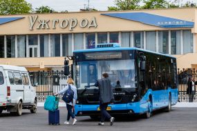 Passengers get on the bus