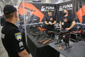 Firearms are presented at the exhibition