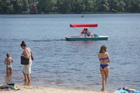 People relax on the beach
