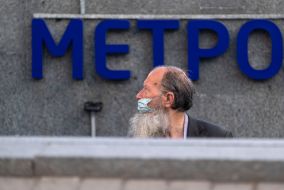 A man near the inscription METRO