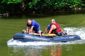 Diving service workers rescue a conditional victim on the water