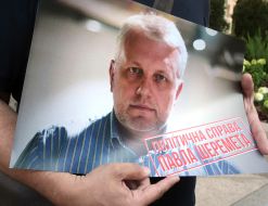 Poster with a portrait of Pavel Sheremet and the inscription "Political case of Pavel Sheremet"