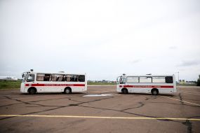 Special buses with rescuers at the airport