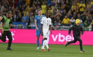 The boy ran out onto the field