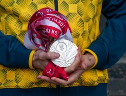 Maxim Veraksa demonstrates his medals