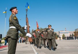 The personnel are solemnly marching along the parade ground