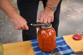 Volunteers prepare adjika for the fighters