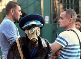 Mannequin in gas mask and cap