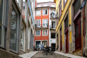 Terrace of a restaurant on one of the narrow streets in the old town of Porto