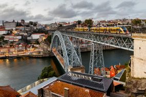 View of the bridge of Don Luis I from the town of Vila Nova de Gaia in Porto