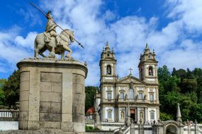 Statue of St. Longinus and the Church of the Merciful Jesus on the Mountain