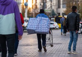 Man carries a huge bag