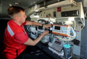 The doctor demonstrates the operation of onboard medical equipment