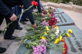 Flower laying ceremony near the monument in Babi Yar