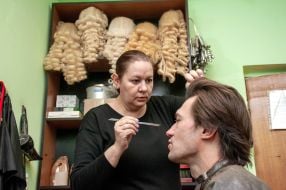 The actor is being made up