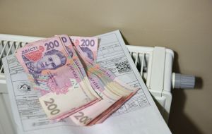 Money and receipts near the battery