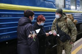 The passenger presents the documents to the conductor