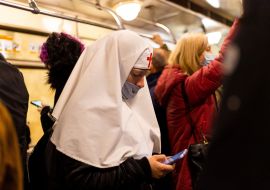 Nun in a mask in the subway