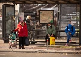 People at the transport stop