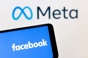 The logo of the Facebook on a smartphone screen