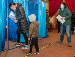 Voters vote at a polling station in Kharkiv