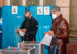 Voters vote at a polling station in Kharkiv