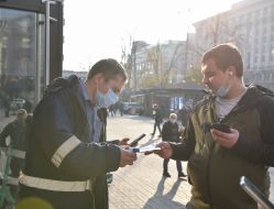 Checking COVID-certificates at the entrance to McDonald's in Kiev