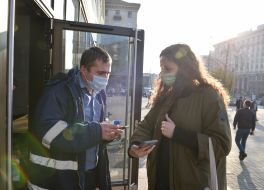 Checking COVID-certificates at the entrance to McDonald's in Kiev