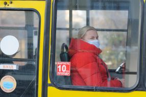 People in protective masks near the clinic