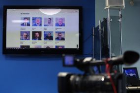 Materials of the press conference on the TV screen