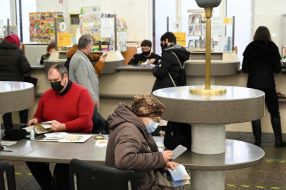 People in the building of the Main Post Office