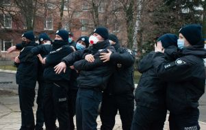 Police officers practice water rescue techniques
