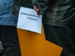 Man holding a poster