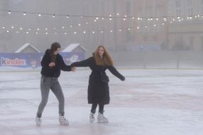 Girls ice skating on a skating rink