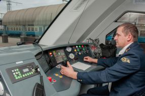 In the cab of the driver of the train "Slobozhansky Express"