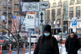 Girl in a protective mask
