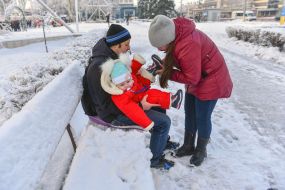 Parents with baby on a walk