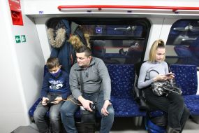 Passengers in the cabin of the electric train