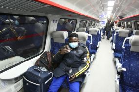 Passengers in the cabin of the electric train