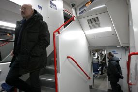 Passengers in the cabin of the electric train
