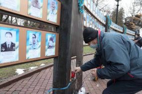 Laying flowers at the Wall of Memory in Ivano-Frankivsk