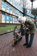 Laying flowers at the Wall of Memory in Ivano-Frankivsk