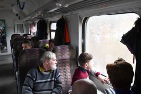 Passengers in a retro train car